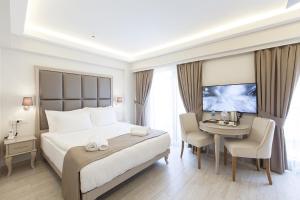 Cama ou camas em um quarto em Perla Galata Hotel