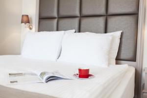 Cama ou camas em um quarto em Perla Galata Hotel