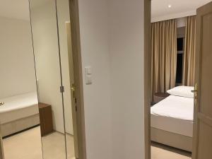 Posteľ alebo postele v izbe v ubytovaní Villa la Val, Apartamenty Wałbrzych