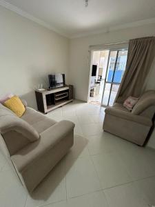 Ruang duduk di Apartamento summer, ótima localização