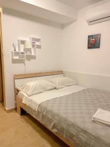 Postel nebo postele na pokoji v ubytování Veronica Rooms, Opatija