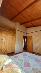 מיטה או מיטות בחדר ב-Casa vista quebracho