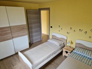Katil atau katil-katil dalam bilik di Mitcho De Mé CIR N 0111