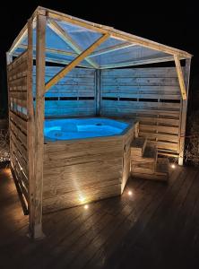 Bazén v ubytování T1, spa privé accès piscine sauna nebo v jeho okolí