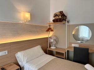 Postel nebo postele na pokoji v ubytování Can Setmanes by CozyCatalonia