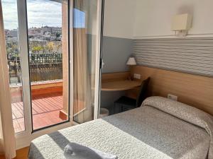 Postel nebo postele na pokoji v ubytování Can Setmanes by CozyCatalonia