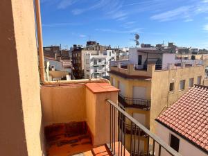 a view of a city from an apartment balcony at Can Setmanes by CozyCatalonia in Blanes