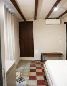 Katil atau katil-katil dalam bilik di La Casetta b & b