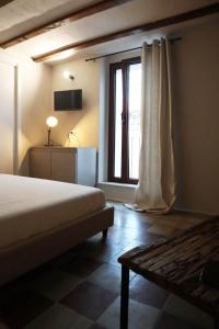 เตียงในห้องที่ La Casetta b & b