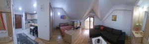 an overhead view of a living room with a couch at Apartment Invictus Mavrovo in Mavrovo