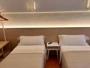 Postel nebo postele na pokoji v ubytování Can Setmanes by CozyCatalonia