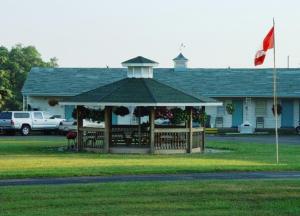 a gazebo in front of a house at Theater Motel in Westfield +2 photos
