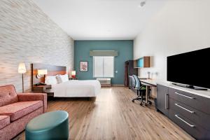 Home2 Suites By Hilton San Bernardino的电视和/或娱乐中心