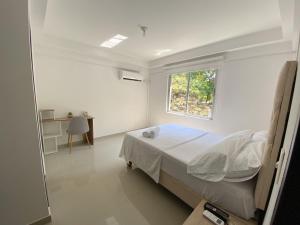 Postel nebo postele na pokoji v ubytování Apartamento en zona rosa Granada