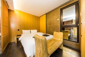 Postel nebo postele na pokoji v ubytování Hotel Cullinan Wangsimni + 37 fotografií