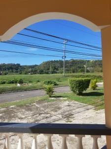 uma vista de uma janela de uma rua em Veronica Homestay Lucea Jamaica em Lucea