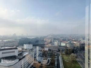 a view of a city from a building at SAG Panorama Apartment 3 rooms 19th floor Great view Free parking in Bratislava