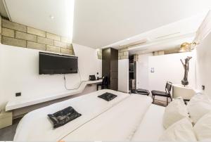 TV o dispositivi per l'intrattenimento presso Hotel Cullinan Wangsimni