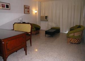 Posezení v ubytování Parque Inn Hotel & Suites