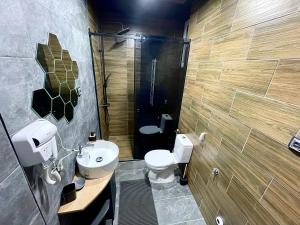 Koupelna v ubytování Spa Apartments UTOPIA + 9 fotografií