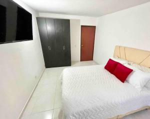 Ein Bett oder Betten in einem Zimmer der Unterkunft Casa Luna Llena