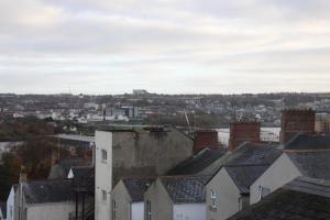 a view of a city with houses and buildings at Station Rooms in Londonderry County Borough
