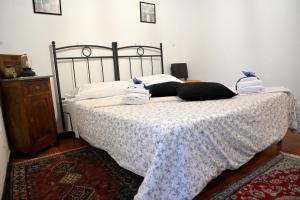Postel nebo postele na pokoji v ubytování Palazzo Granaroli