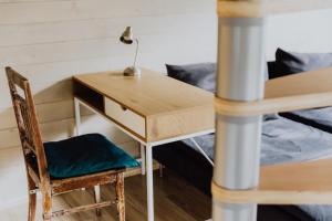 Postel nebo postele na pokoji v ubytování Satori Lounge