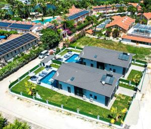 an aerial view of a house with a swimming pool at Dalyan Villa Petra in Dalyan