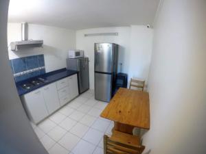 Kuchyň nebo kuchyňský kout v ubytování Hostal Arlegui - Viña Centro