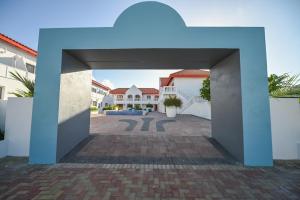 a view of a house from the courtyard at E Solo Aruba Apartments in Oranjestad