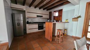 A kitchen or kitchenette at La Casa del Diseñador