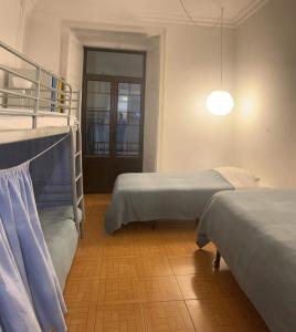 Postel nebo postele na pokoji v ubytování Peniche Hostel