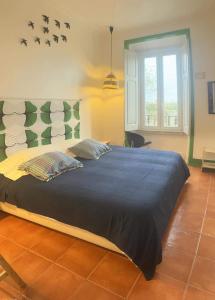 Postel nebo postele na pokoji v ubytování Peniche Hostel