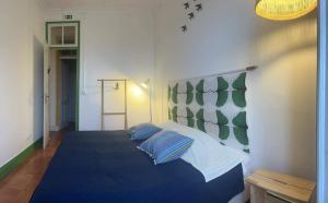 Postel nebo postele na pokoji v ubytování Peniche Hostel
