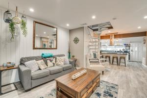 a living room with a couch and a table at Family Home with Private Pool 24 Mi to Disney! in Saint Cloud