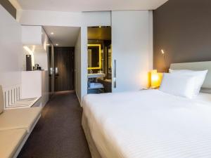 Voodi või voodid majutusasutuse Pullman Brussels Centre Midi toas
