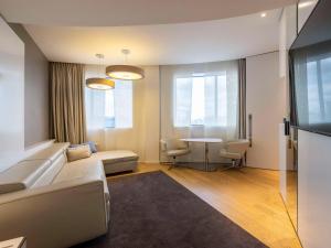 Voodi või voodid majutusasutuse Pullman Brussels Centre Midi toas
