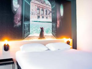 Postel nebo postele na pokoji v ubytování ibis Styles Lille Neuville en Ferrain