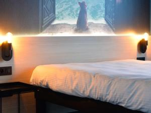 Postel nebo postele na pokoji v ubytování ibis Styles Lille Neuville en Ferrain