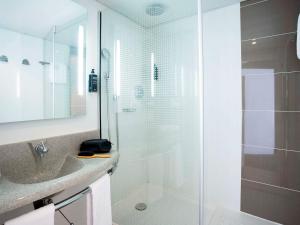 Koupelna v ubytování ibis Styles Lille Neuville en Ferrain