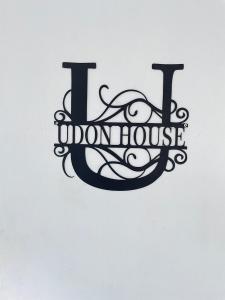 un segno con le parole I umbrellaulse di Udon House a Udon Thani