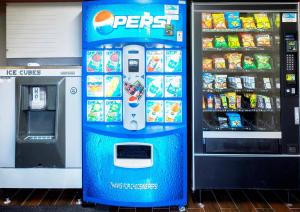 a pepsi vending machine in a store with food at Red Roof Inn Santee in Santee