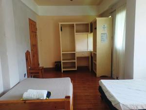 Postel nebo postele na pokoji v ubytování Pas-it Hostel Sagada