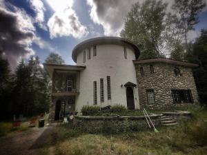 an old building with a dome on top of it at Chambre chez l'Habitant - La Templière in Val-David