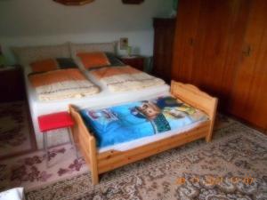מיטה או מיטות בחדר ב-Apartment in Dankerode - Harz 40750