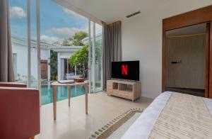 TV/Unterhaltungsangebot in der Unterkunft Taman Mesari Luxury Villas-Seminyak