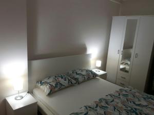 Llit o llits en una habitació de Apartman Bedem