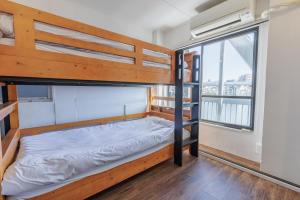 Postel nebo postele na pokoji v ubytování Hostel Chapter Two Tokyo