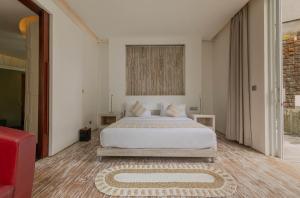 Ein Bett oder Betten in einem Zimmer der Unterkunft Taman Mesari Luxury Villas-Seminyak